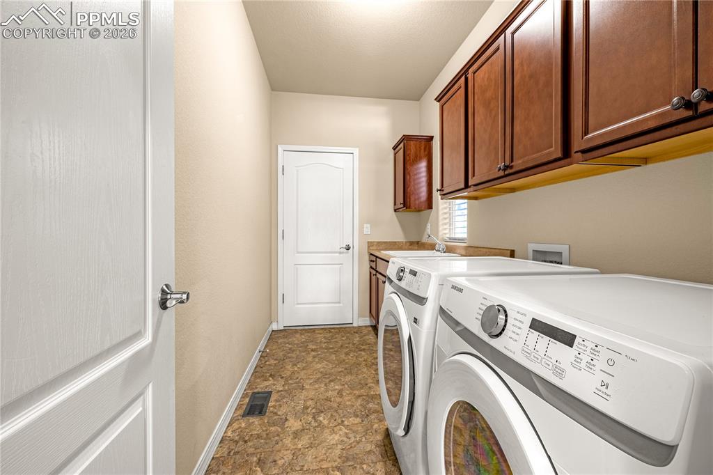 Image 27 of 35: Main level laundry