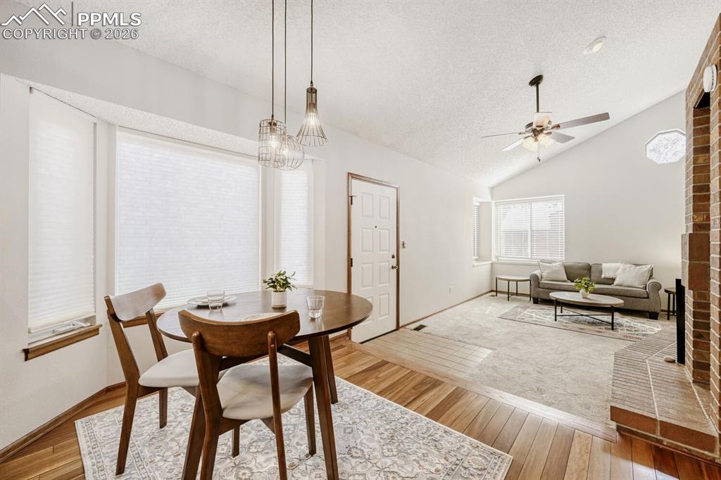 Image 13 of 34: Dining area featuring a ceiling fan, hardwood / wood-style floors, and carp