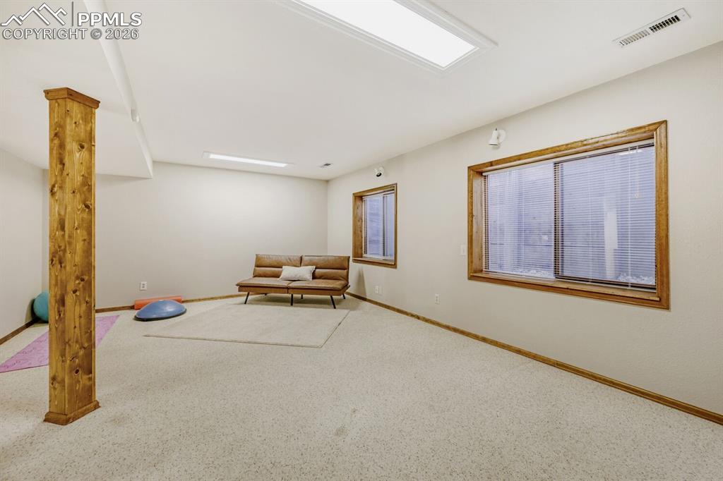 Image 14 of 34: Sitting room featuring carpet floors and baseboards