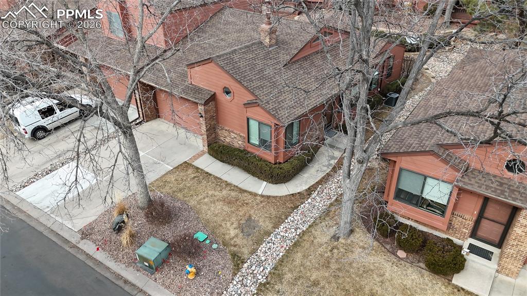 Image 30 of 34: Aerial view of property and surrounding area