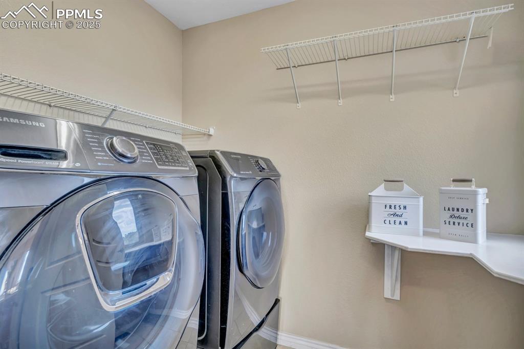 Image 26 of 41: Sunny Laundry includes on Upper includes Washer & Dryer; Folding Counter!