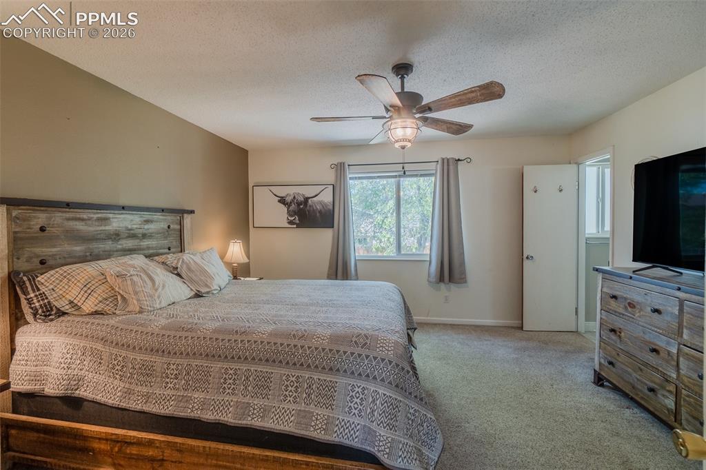 Image 15 of 31: Featuring neutral-toned walls, a window with exterior views, and a ceiling 