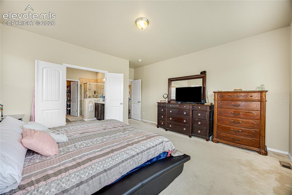 Image 31 of 43: Primary Bedroom