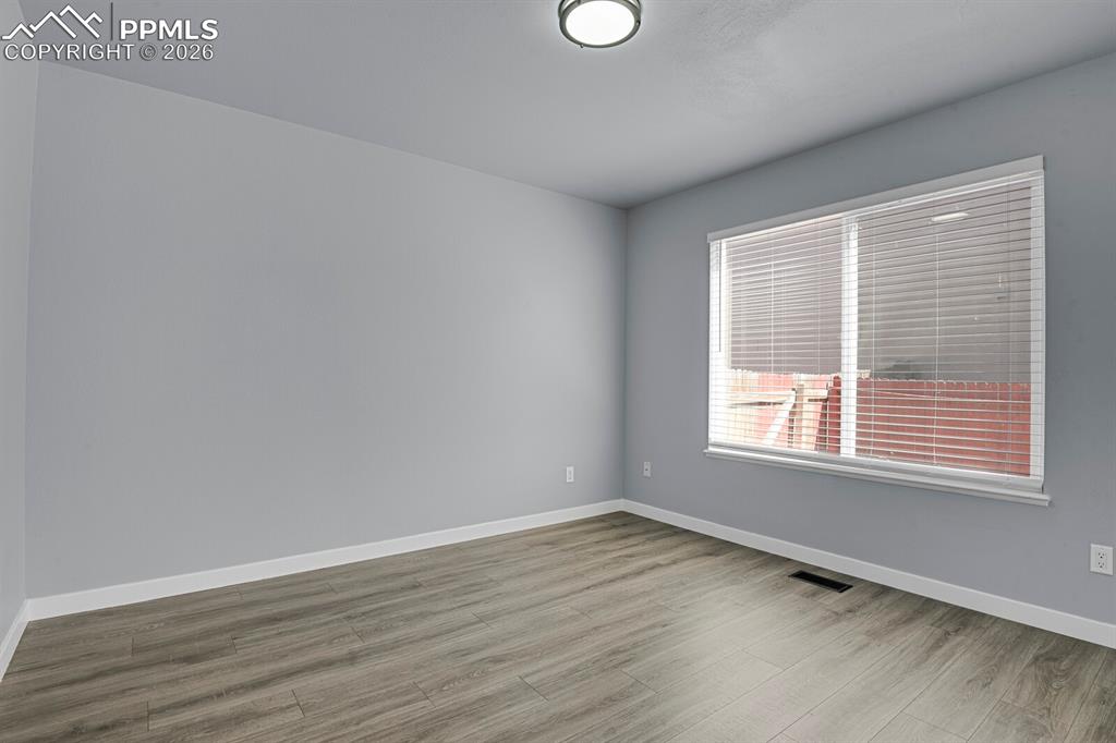 Image 14 of 38: 1 of 2 Primary Bedrooms - Main Level