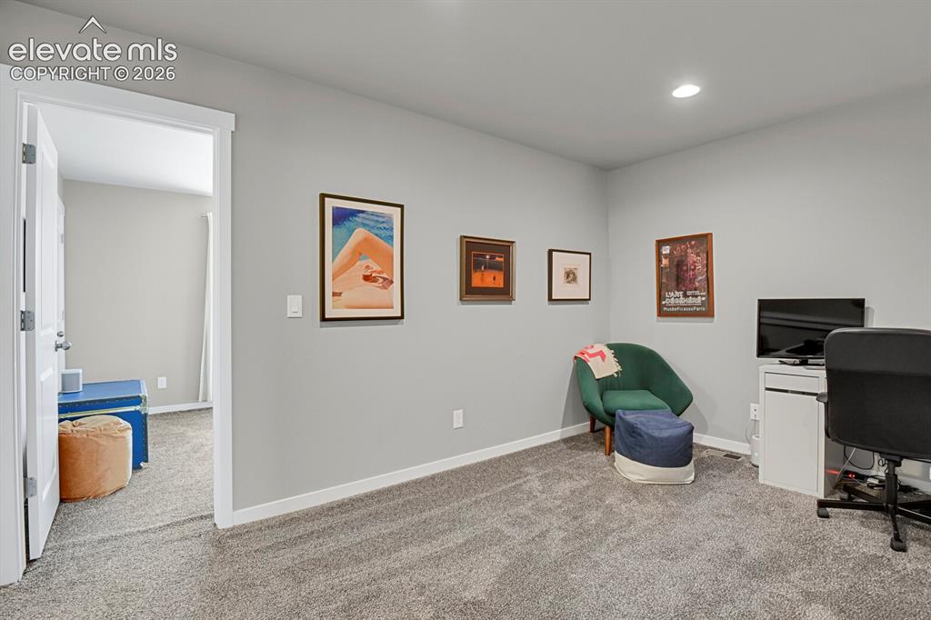 Image 15 of 26: Loft on upper level can be used for work out room, office or play area