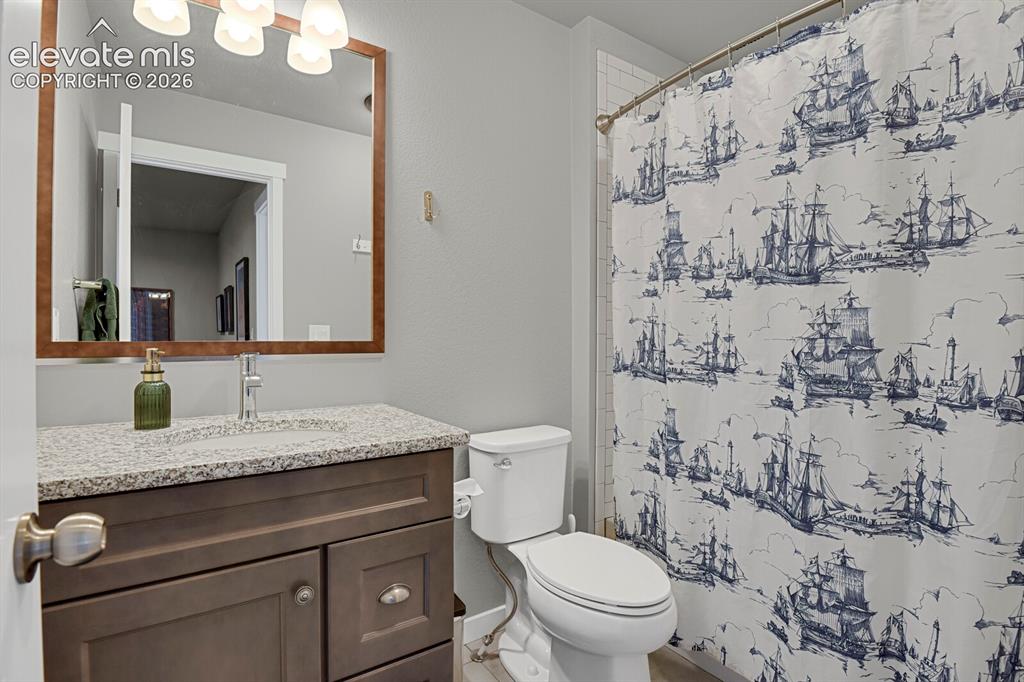 Image 22 of 26: Upper level main bath