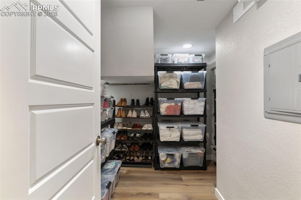 Image 30 of 39: Storage area with electric panel