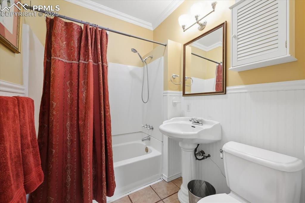 Image 18 of 48: Updated full bathroom.