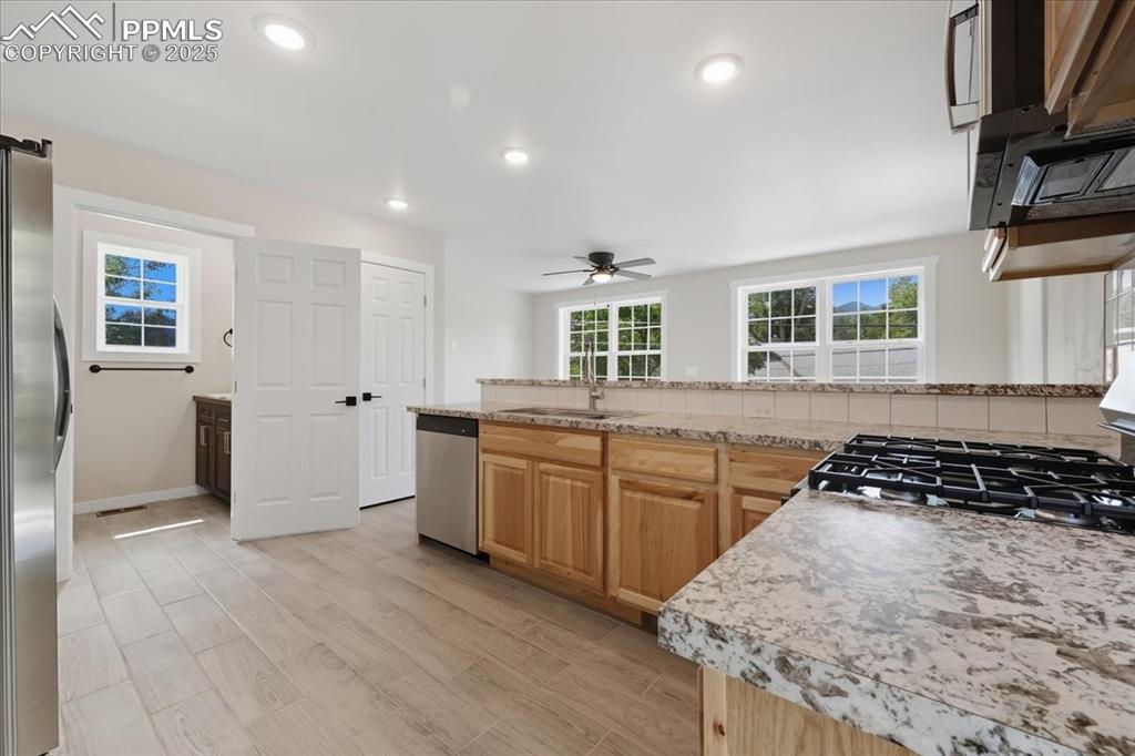 Image 22 of 48: 2nd home. Very open and tons of sunlight.