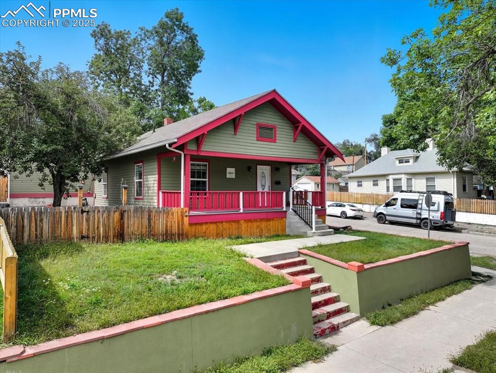 Image 3 of 48: The original Bungalow-style home with great curb appeal.