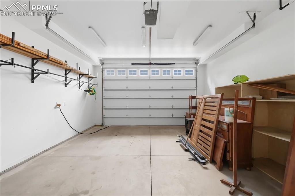 Image 40 of 48: Finished, heated garage with 10