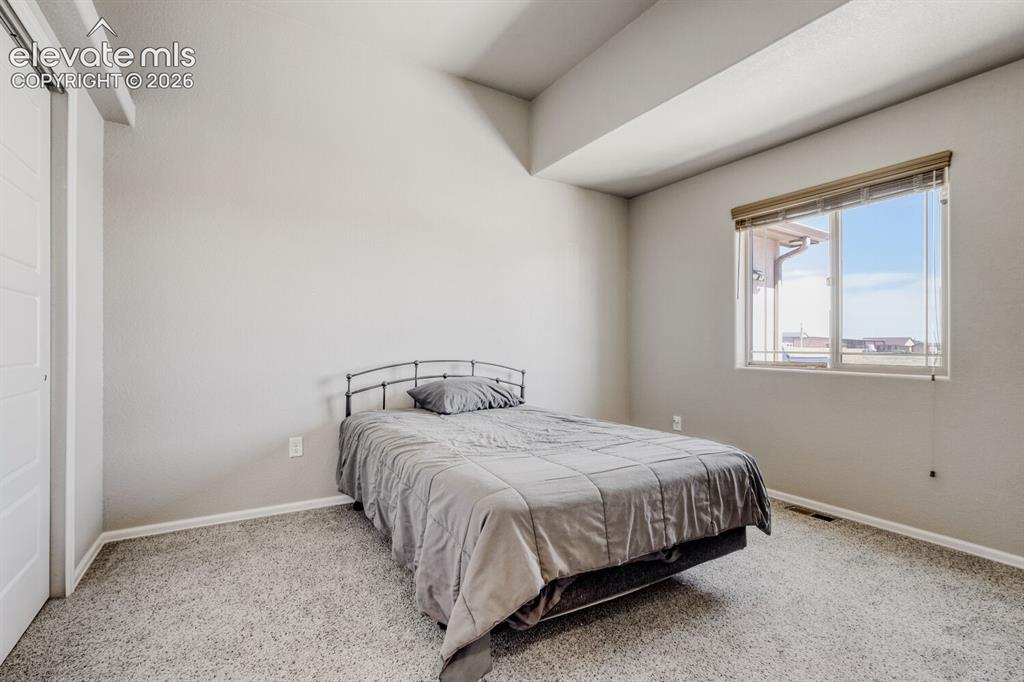 Image 14 of 39: Bedroom