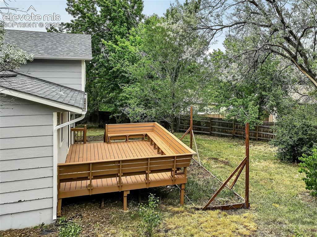 Image 24 of 50: Deck From the Side Yard