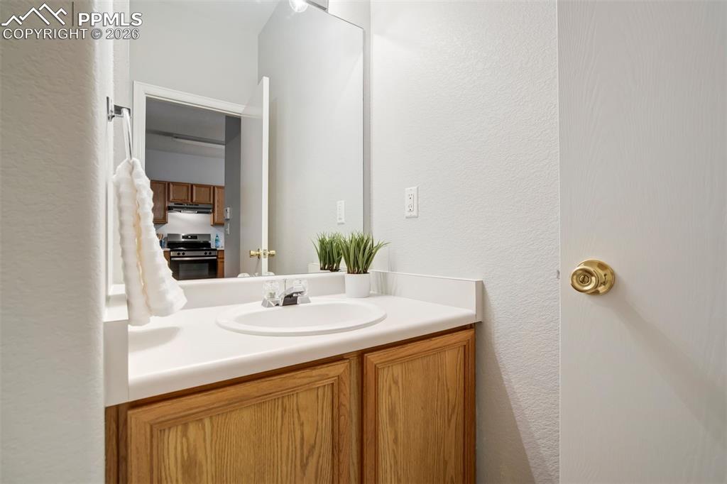 Image 13 of 31: Powder bathroom on the main level. 