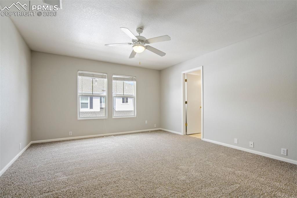 Image 16 of 31: Spacious enough for a bed, dresser, and the mysterious pile of laundry we a