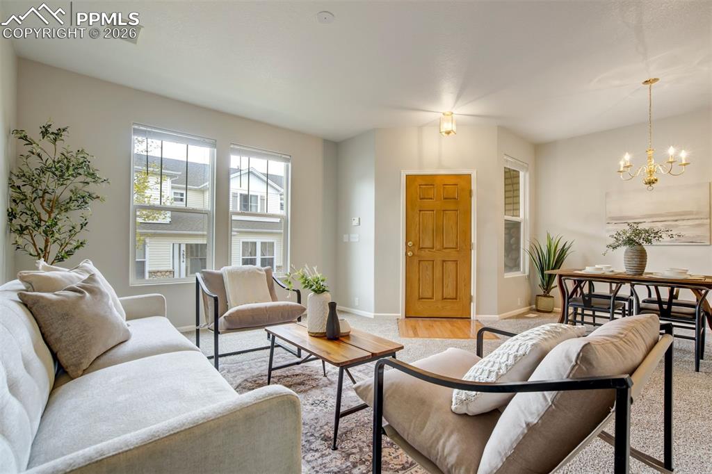 Image 3 of 31: A living room that proves you don’t need a ballroom to relax after a long d