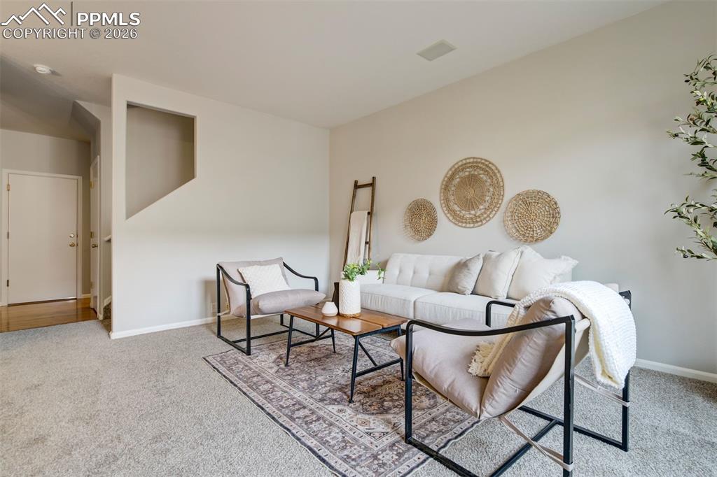 Image 6 of 31: A living room that keeps things simple. 