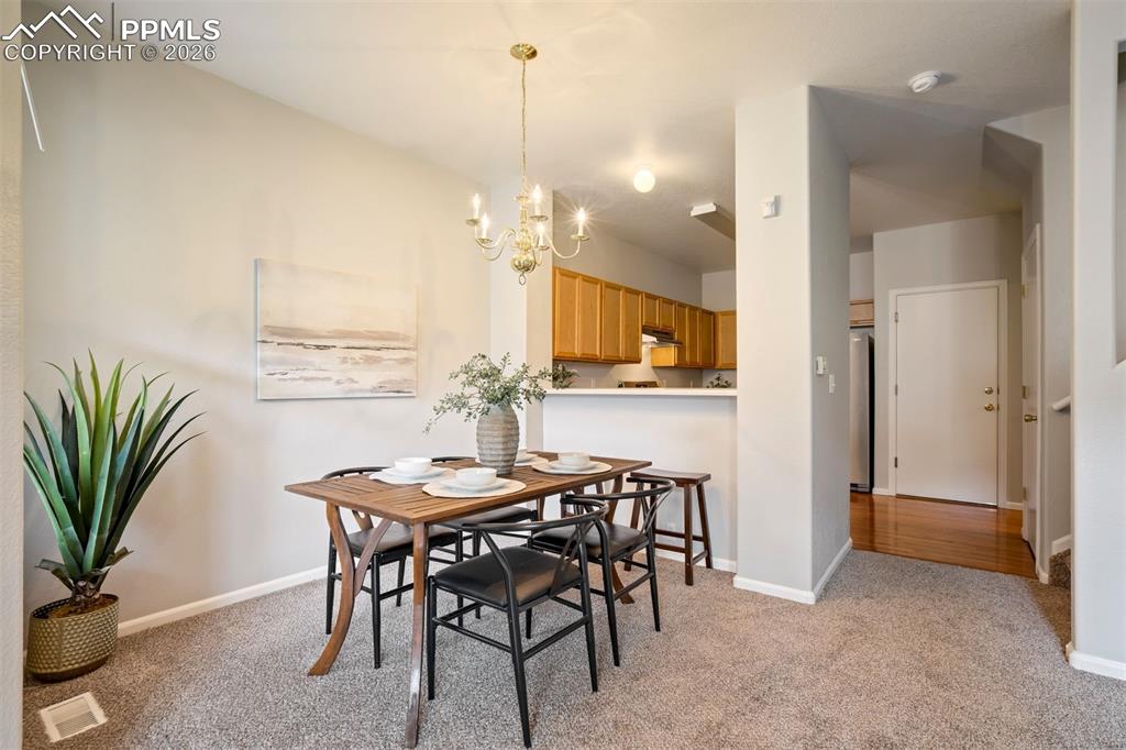 Image 7 of 31: Dining area or perfect office space for our work from home warriors. 