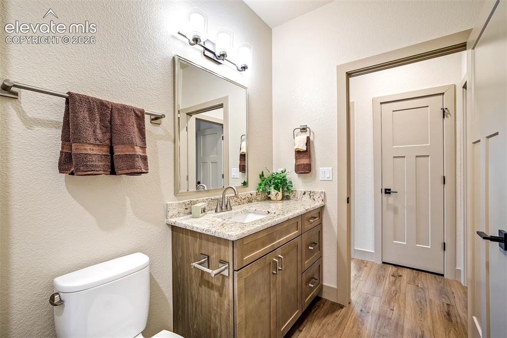 Image 30 of 48: Lovely vanity with separate water closet.