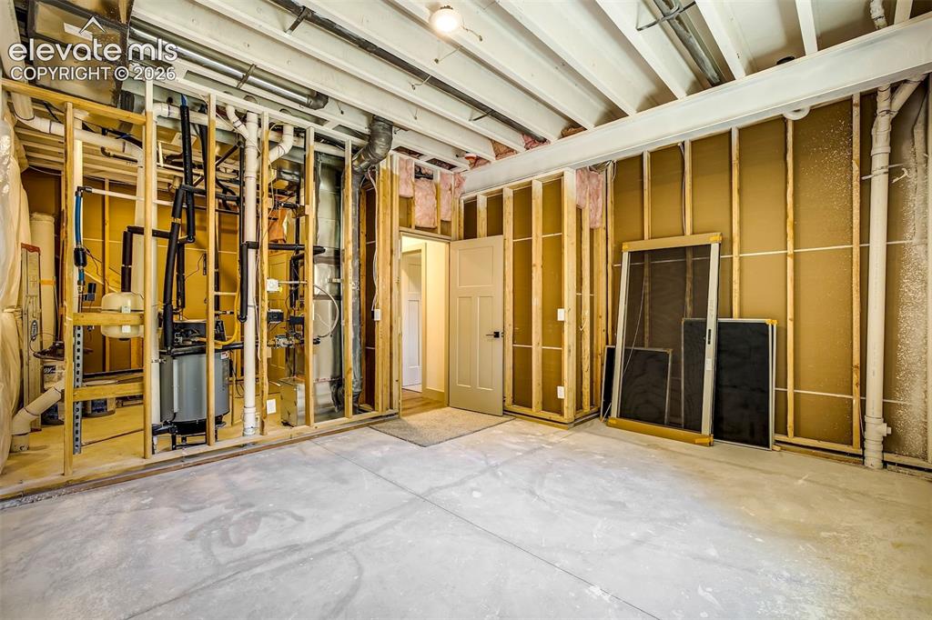 Image 45 of 48: Lower level Family room with a walk-out to 10 x 20 patio.