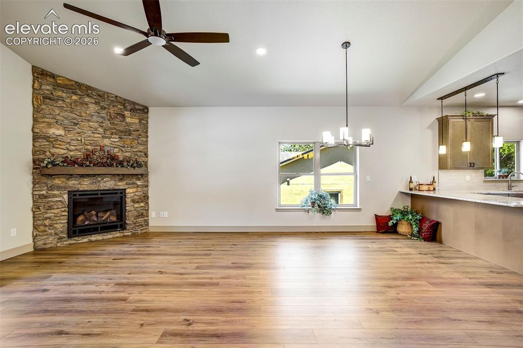 Image 7 of 48: Lovely Great Room with living and dining areas.