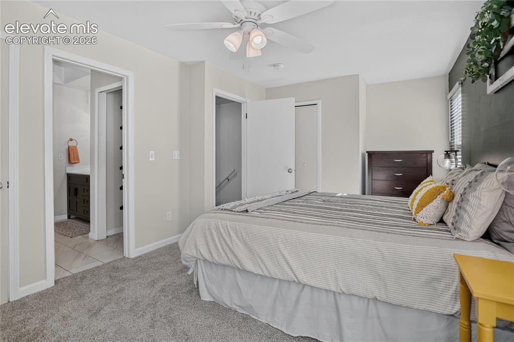 Image 11 of 20: Primary has walk-in closet & bathroom access
