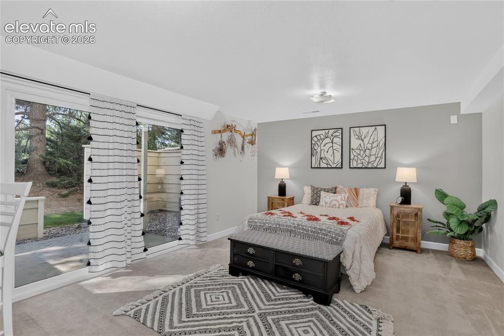 Image 15 of 20: Bedroom 3 w/ walk-out - lower level