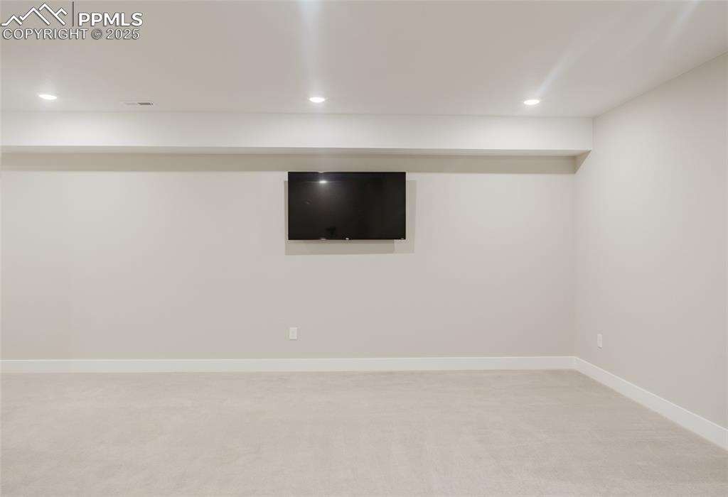 Image 18 of 31: The freshly finished family room is ready for relaxation or play! 