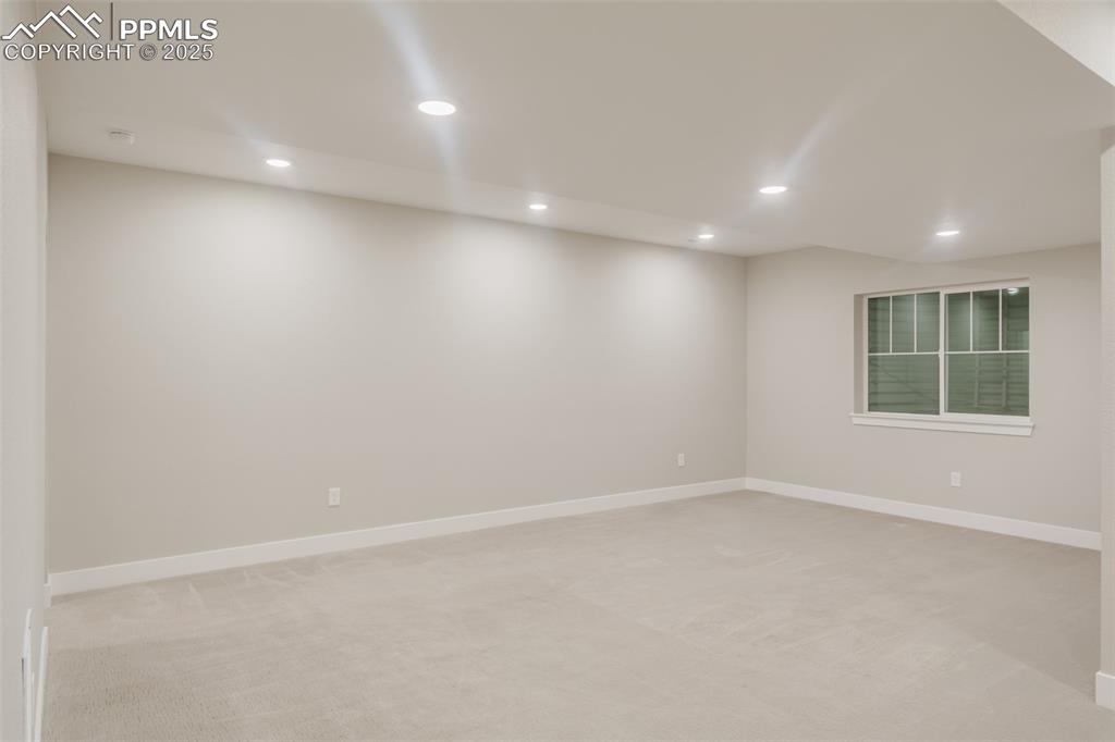 Image 19 of 31: The sellers just had the basement finished and it is lovely! 