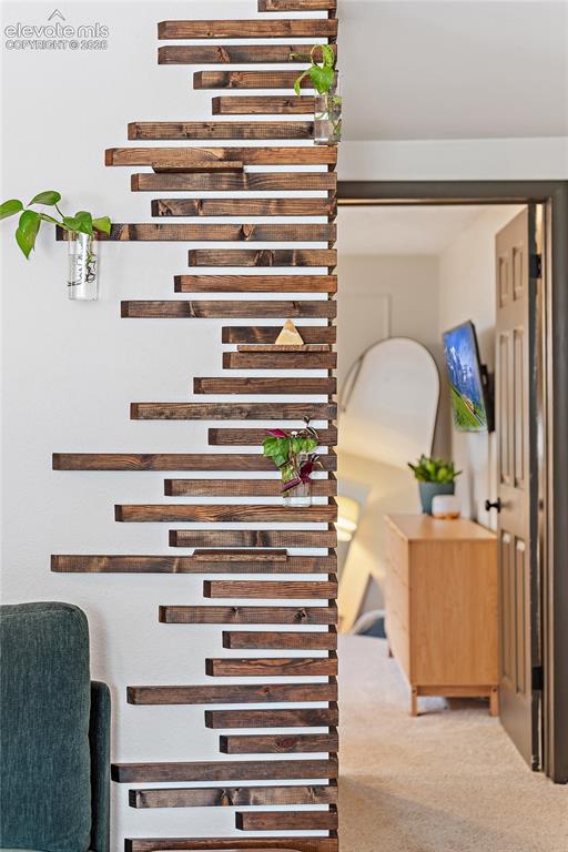 Image 18 of 43: Decorative wood slat wall partition