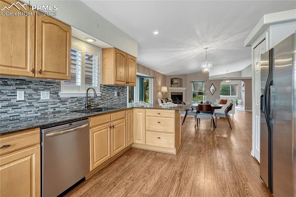 Image 13 of 38: Counter bar and pantry.