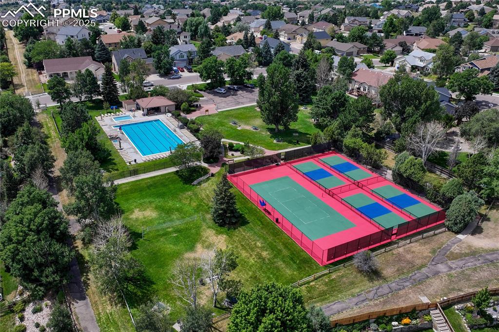 Image 35 of 38: Beautifully kept pool, tennis and pickle ball courts.