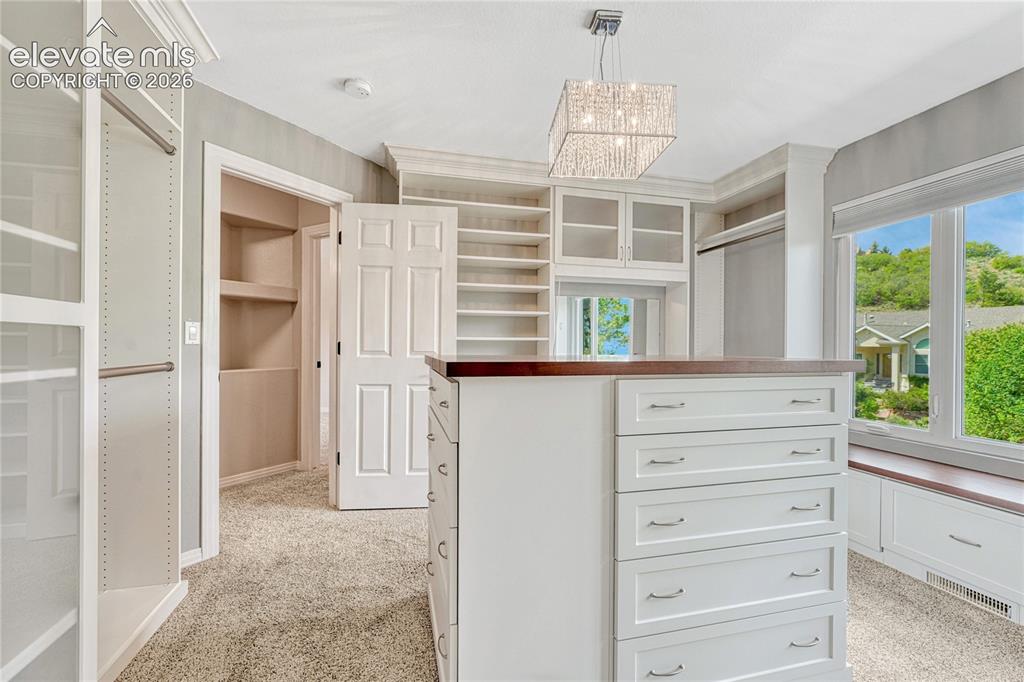 Image 32 of 50: While this is a converted bedroom to closet, it can easily be changed back 