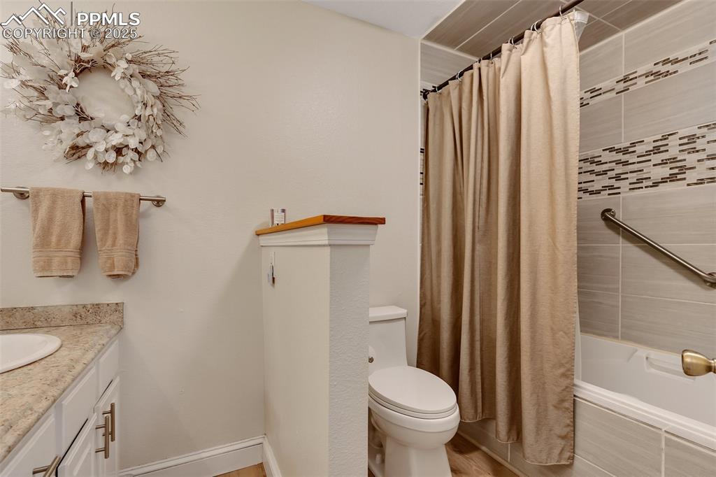 Image 20 of 41: Full bath featuring tiled shower / bath and vanity