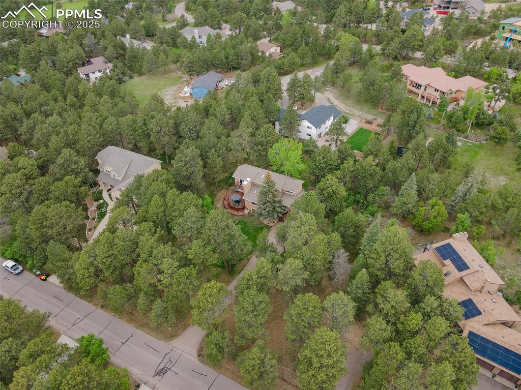 Image 39 of 41: Aerial view of property and surrounding area featuring nearby suburban area