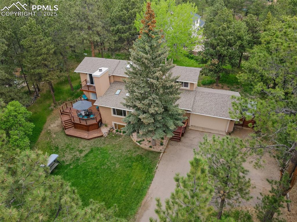 Image 6 of 41: Aerial view of property and surrounding area