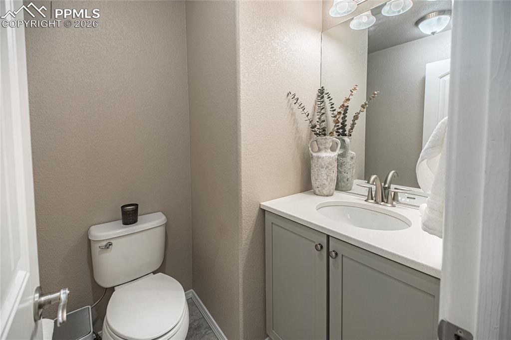 Image 32 of 32: Main level powder room
