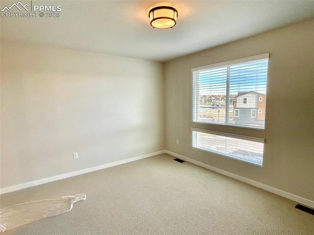 Image 14 of 25: Master Bedroom