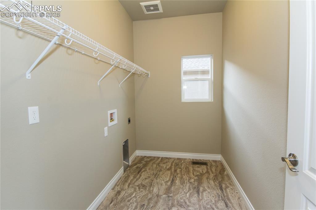Image 12 of 28: Washroom featuring hookup for a washing machine, hookup for an electric dry