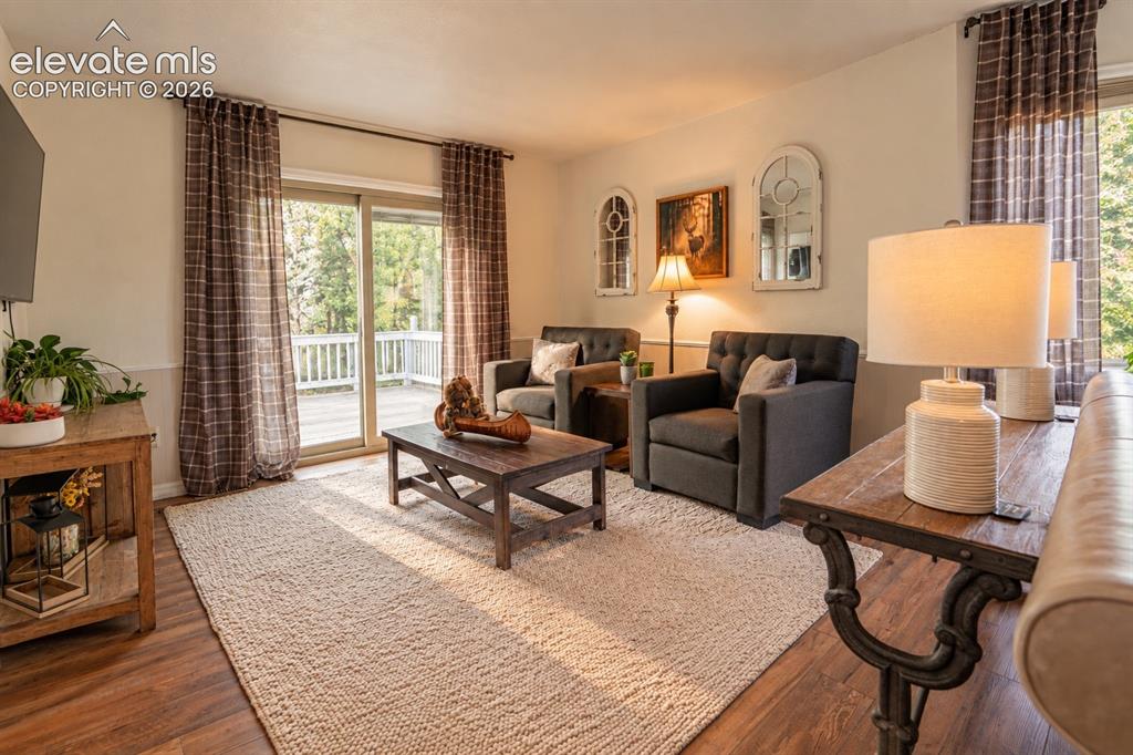 Image 6 of 30: Wood-finish flooring throughout