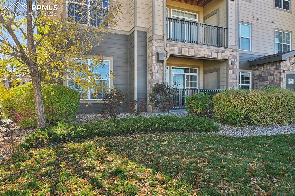 Image 3 of 25: Back patio that faces open space