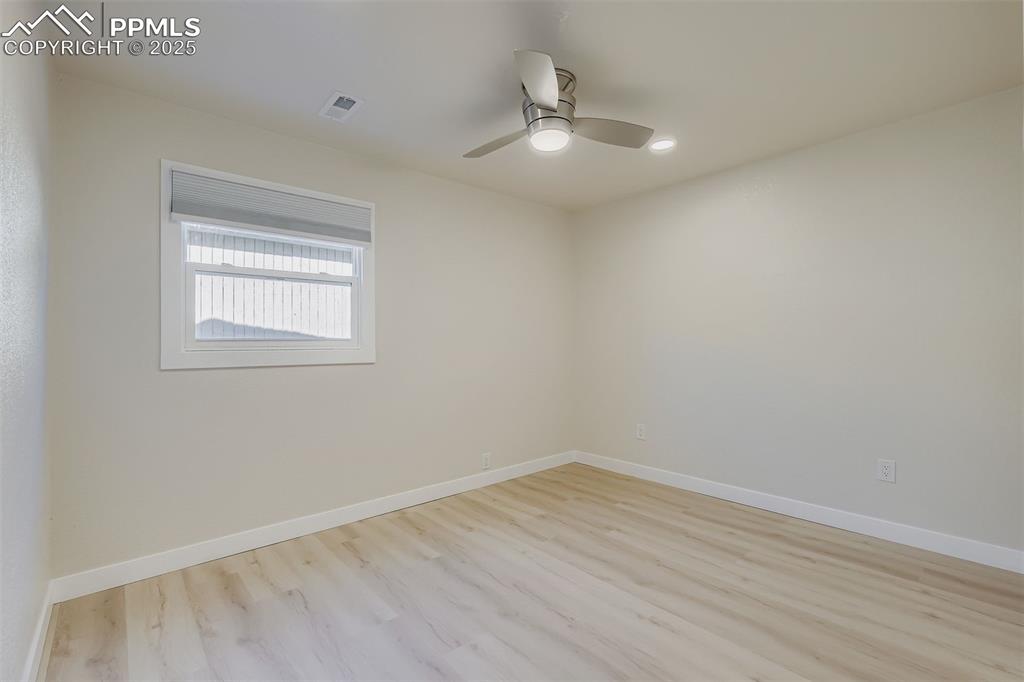 Image 19 of 31: Main floor bedroom 1