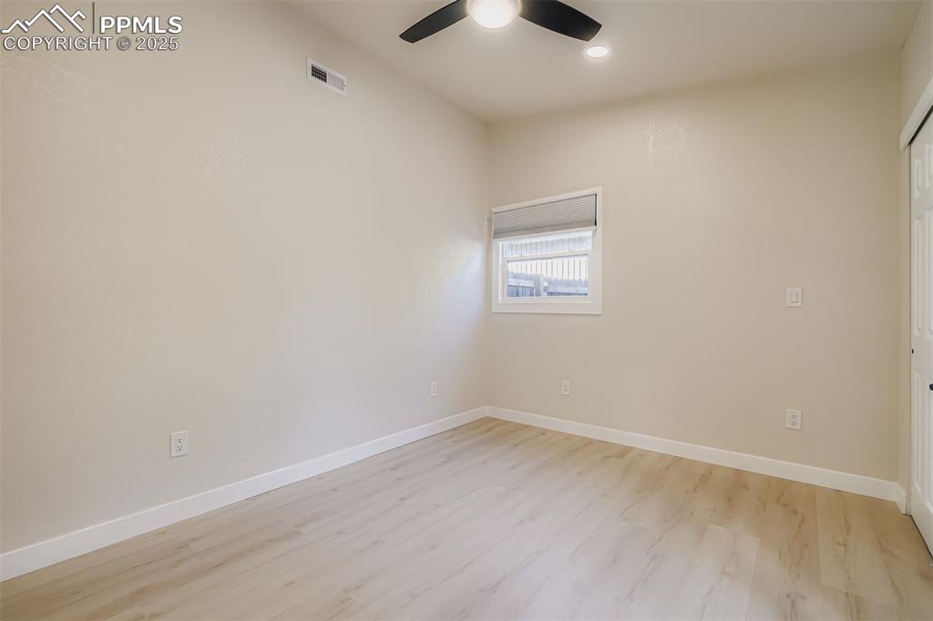 Image 22 of 31: Main floor bedroom 3