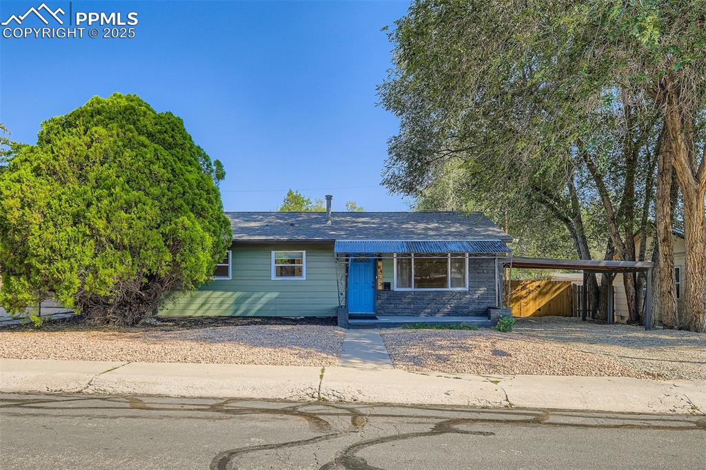 Image 4 of 31: Off street parking and large carport