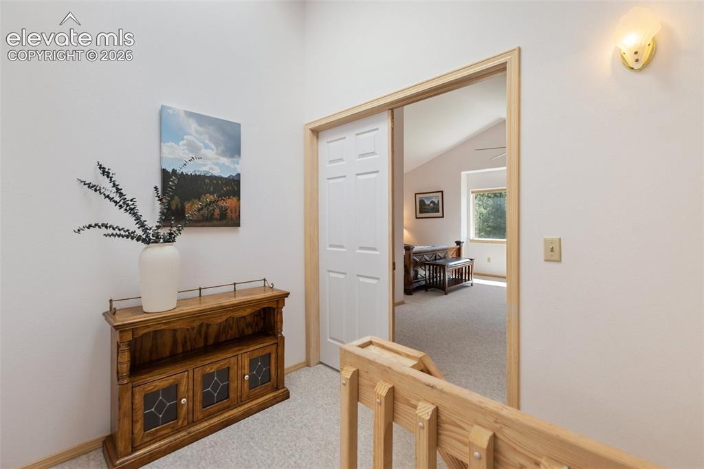 Image 15 of 45: Upper Level Stair Landing