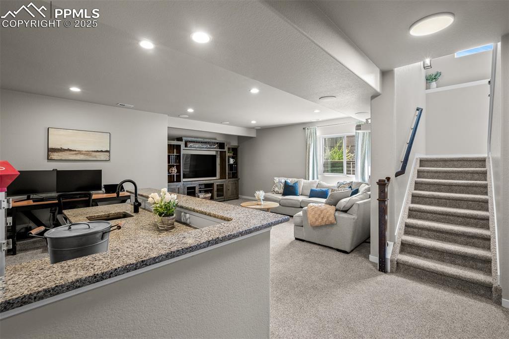 Image 27 of 37: Basement with plenty of room for entertaining
