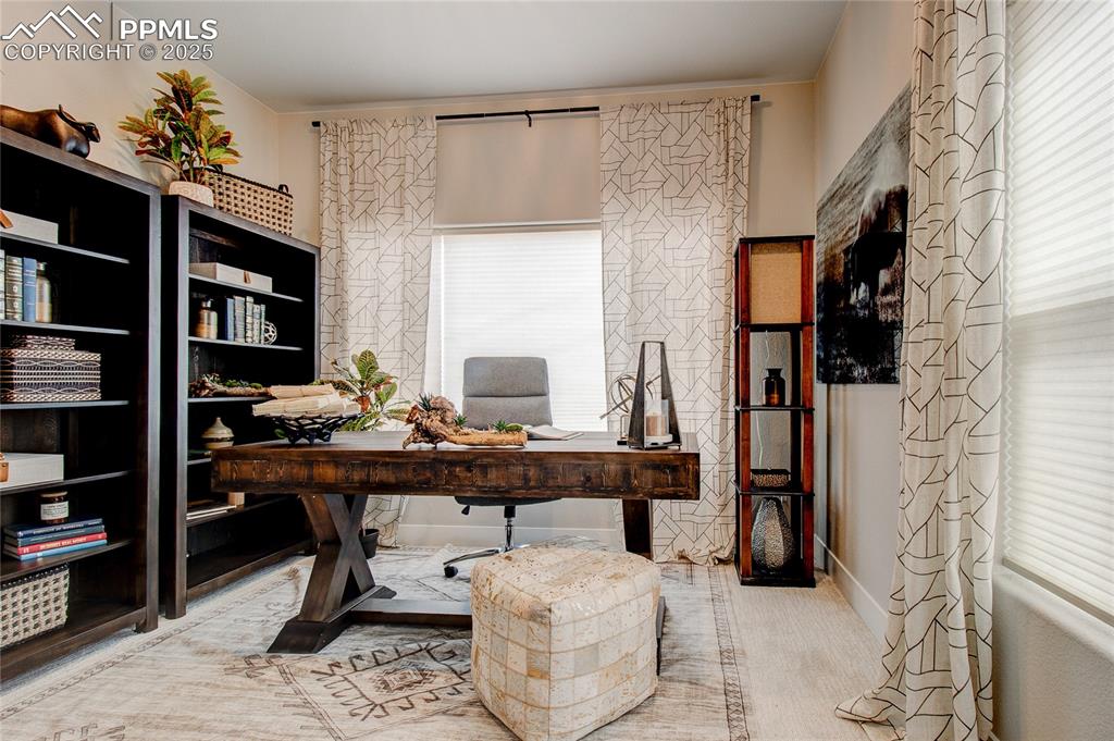 Image 3 of 29: Office space with baseboards