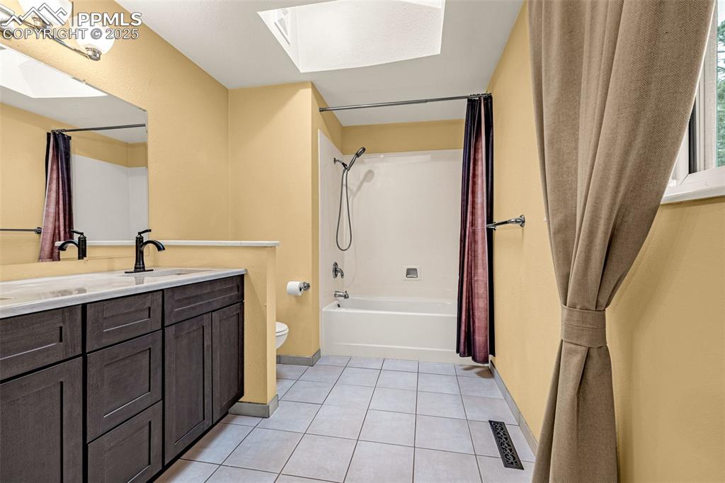 Image 18 of 50: Upper level bedroom with Quartz counter tops new vanity/sink
