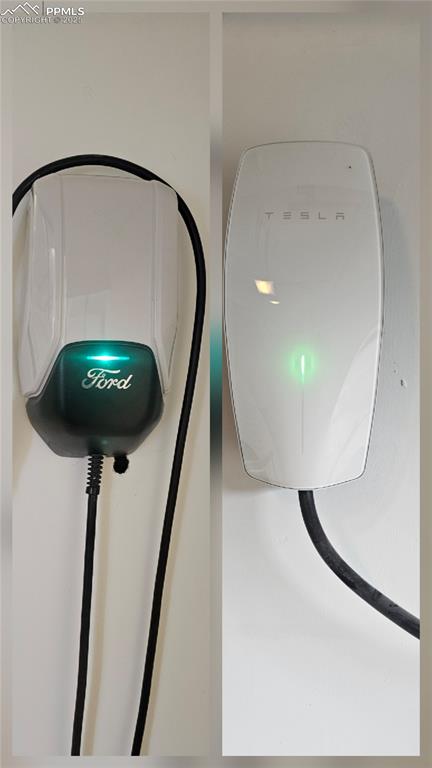 Image 50 of 50: Detailed view of electric vehicle charger Tesla and Ford EV chargers