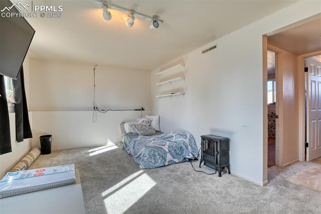 Image 25 of 43: Bedroom